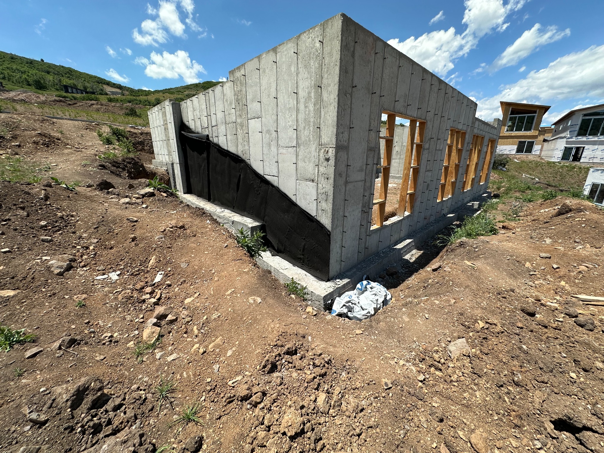 Active construction foundation work at Benloch Ranch
