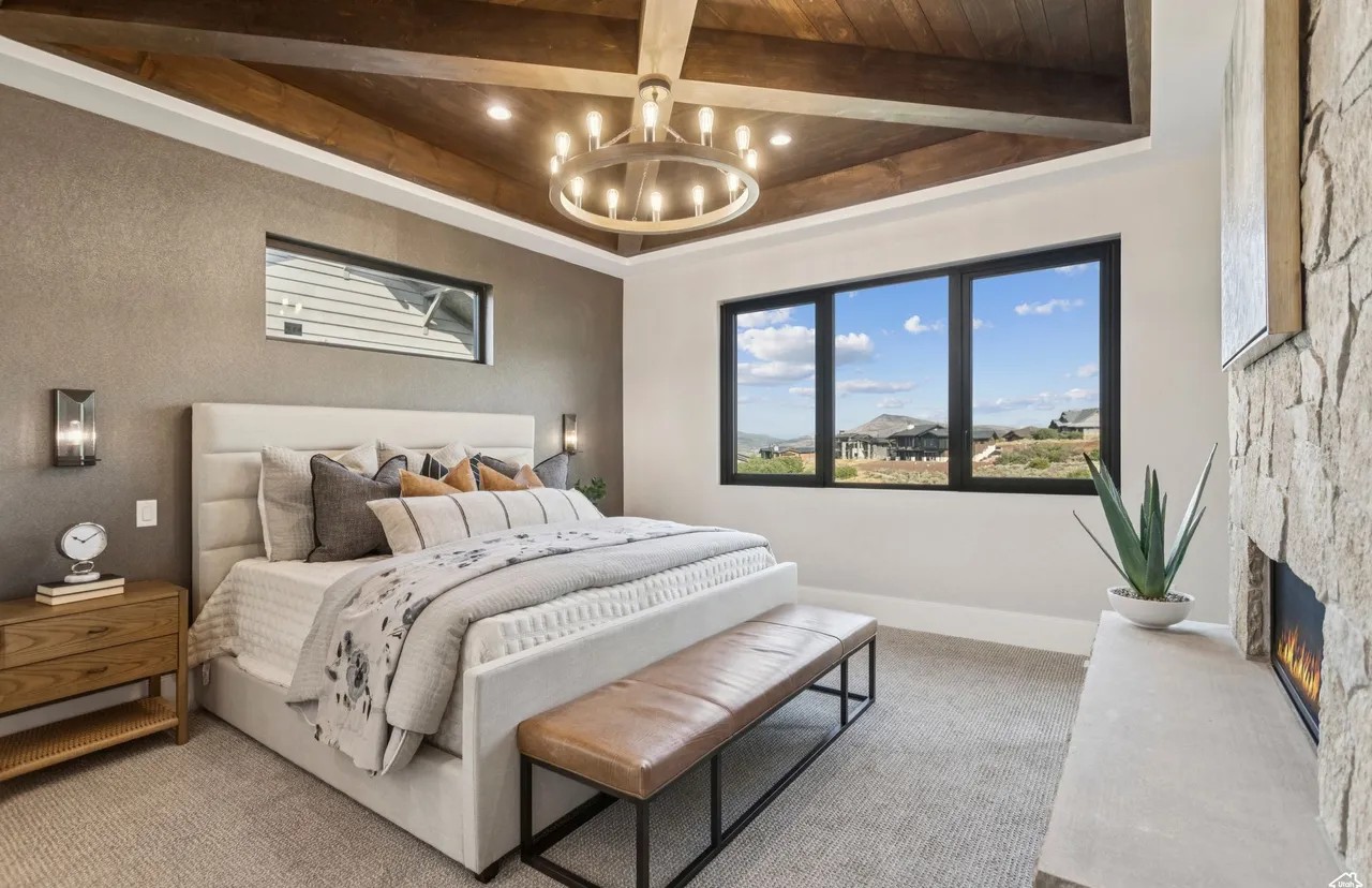 Primary bedroom suite with panoramic mountain views