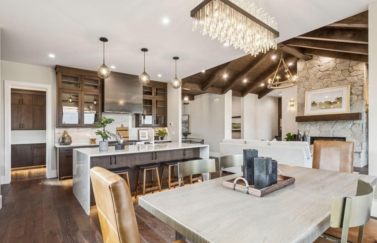 Open-plan living and dining area with mountain views