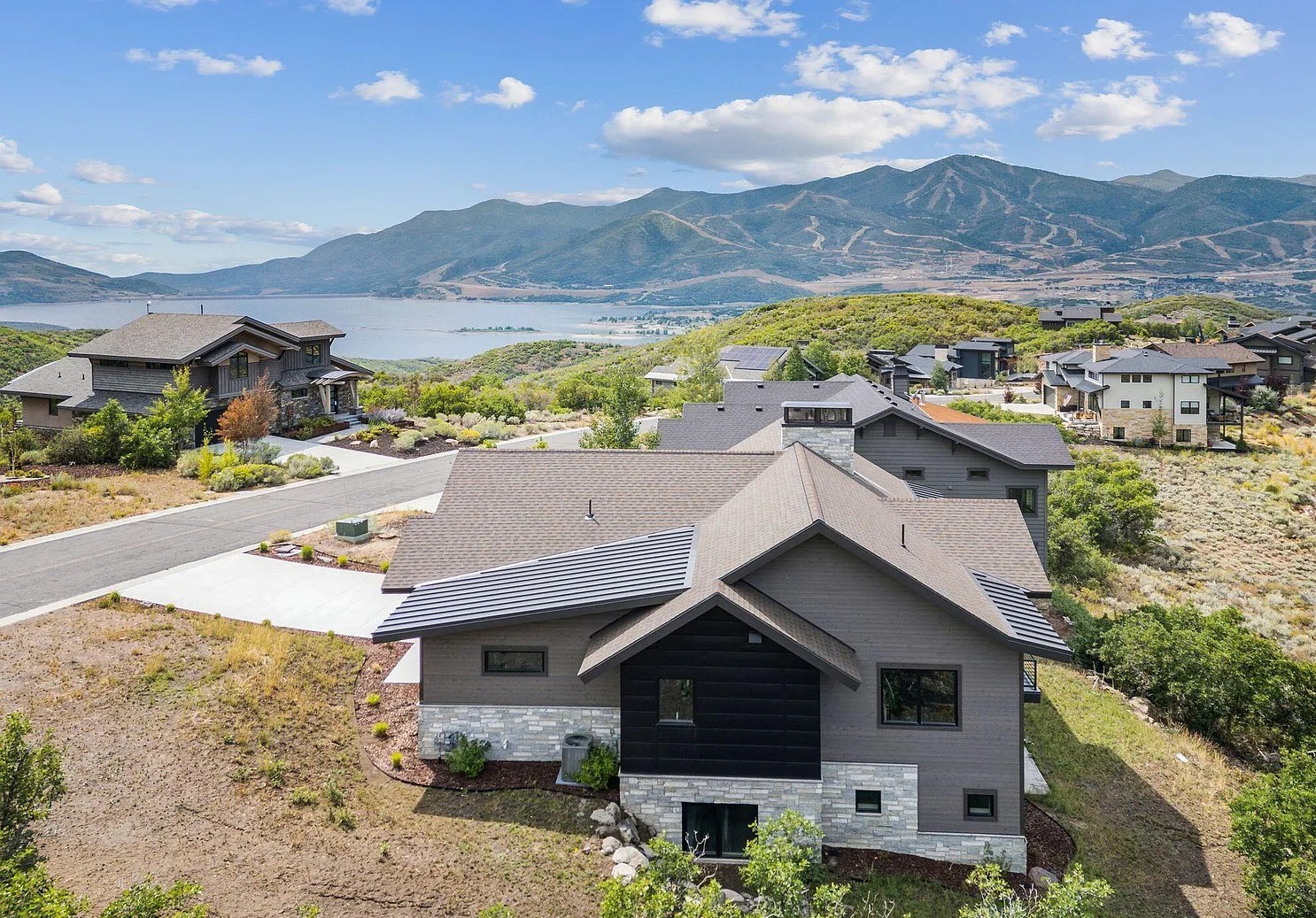 Aerial view of Three Peak's custom home in Hideout overlooking Jordanelle Reservoir