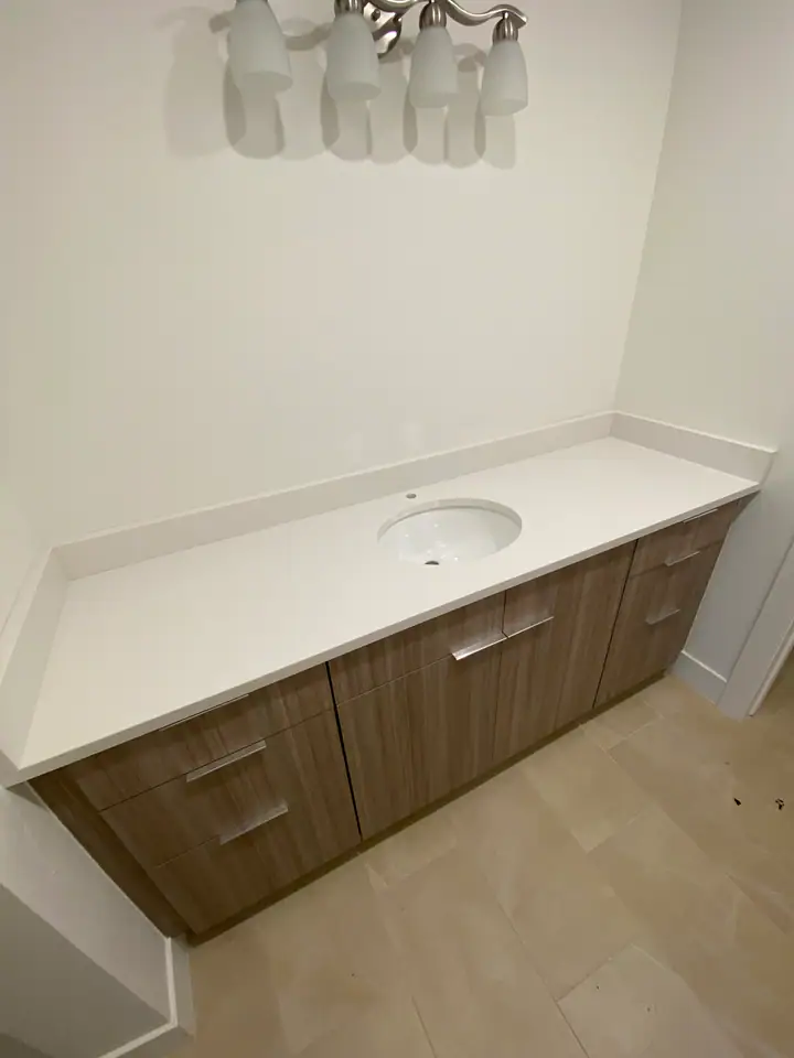 Vanity detail, white quartz countertop close-up