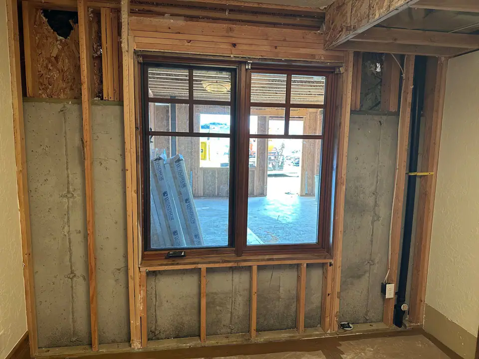 New black-frame windows installed in the addition